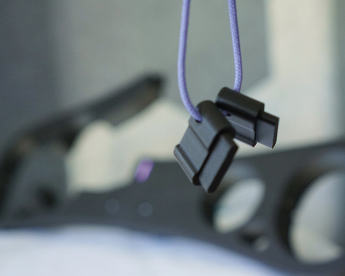 Epoch Key release key on lavender paracord lanyard, close-up